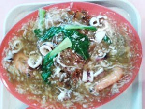 Hor Fun - Broad rice noddles in a thick savoury gravy, with some greens, meat and seafood. An old favourite of the young and the old.